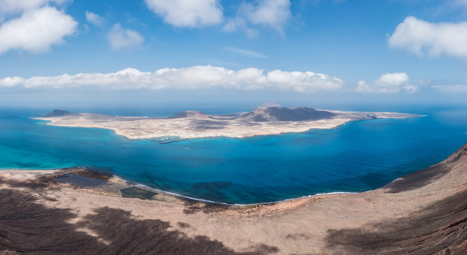 View of La Graciosa island and Caleta del Sebo from the Mirador del Río viewpoint on Lanzarote, Canary Islands