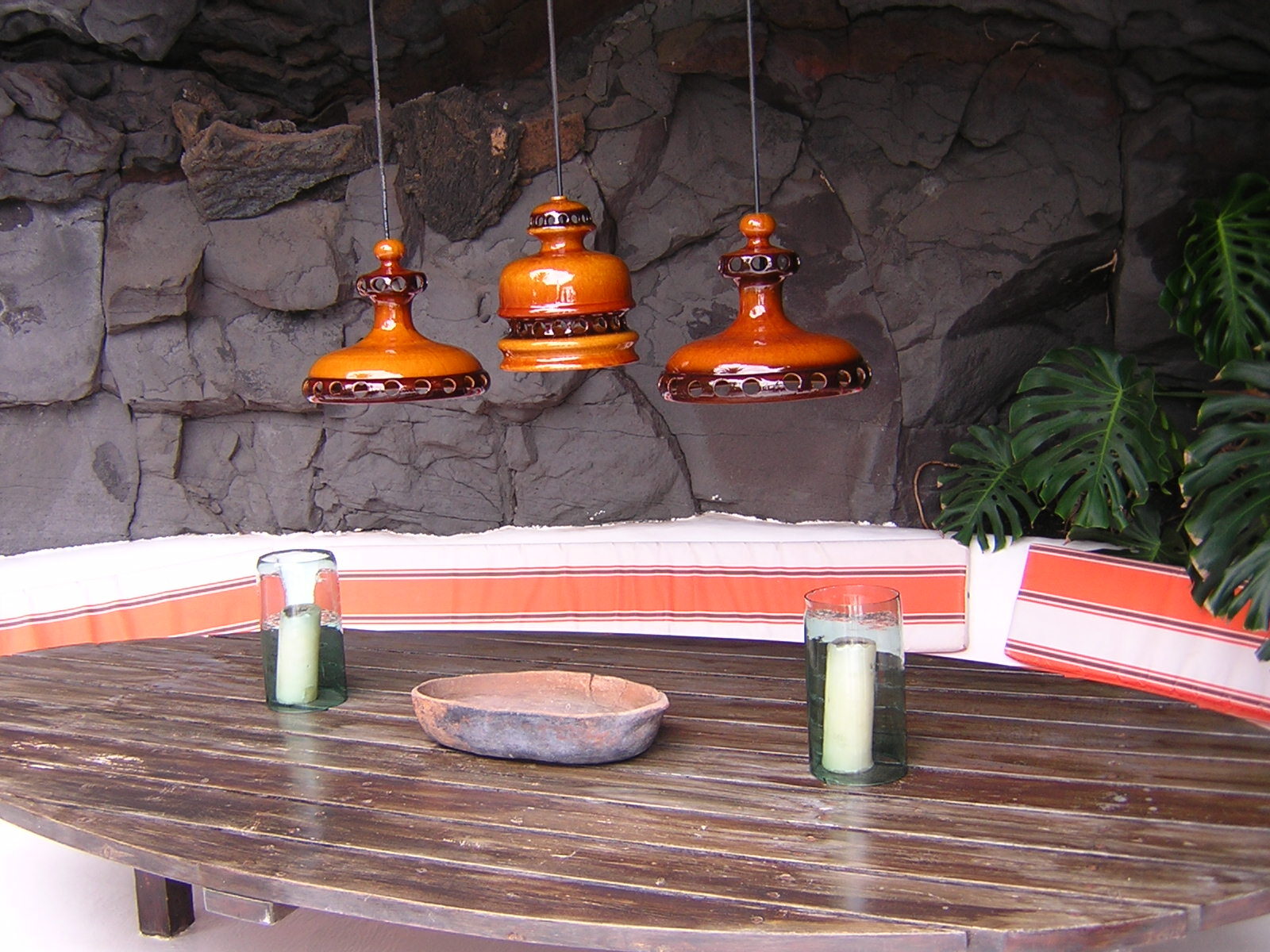 Interior of the Fundación César Manrique at Tahíche showing one of the volcanic bubble rooms with hanging ceramic lamps and lava walls