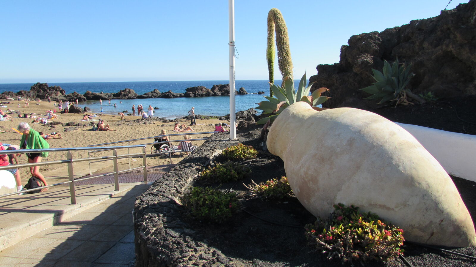 Aerial view of Puerto del Carmen, Lanzarote, showing dense low-rise hotels along the coast