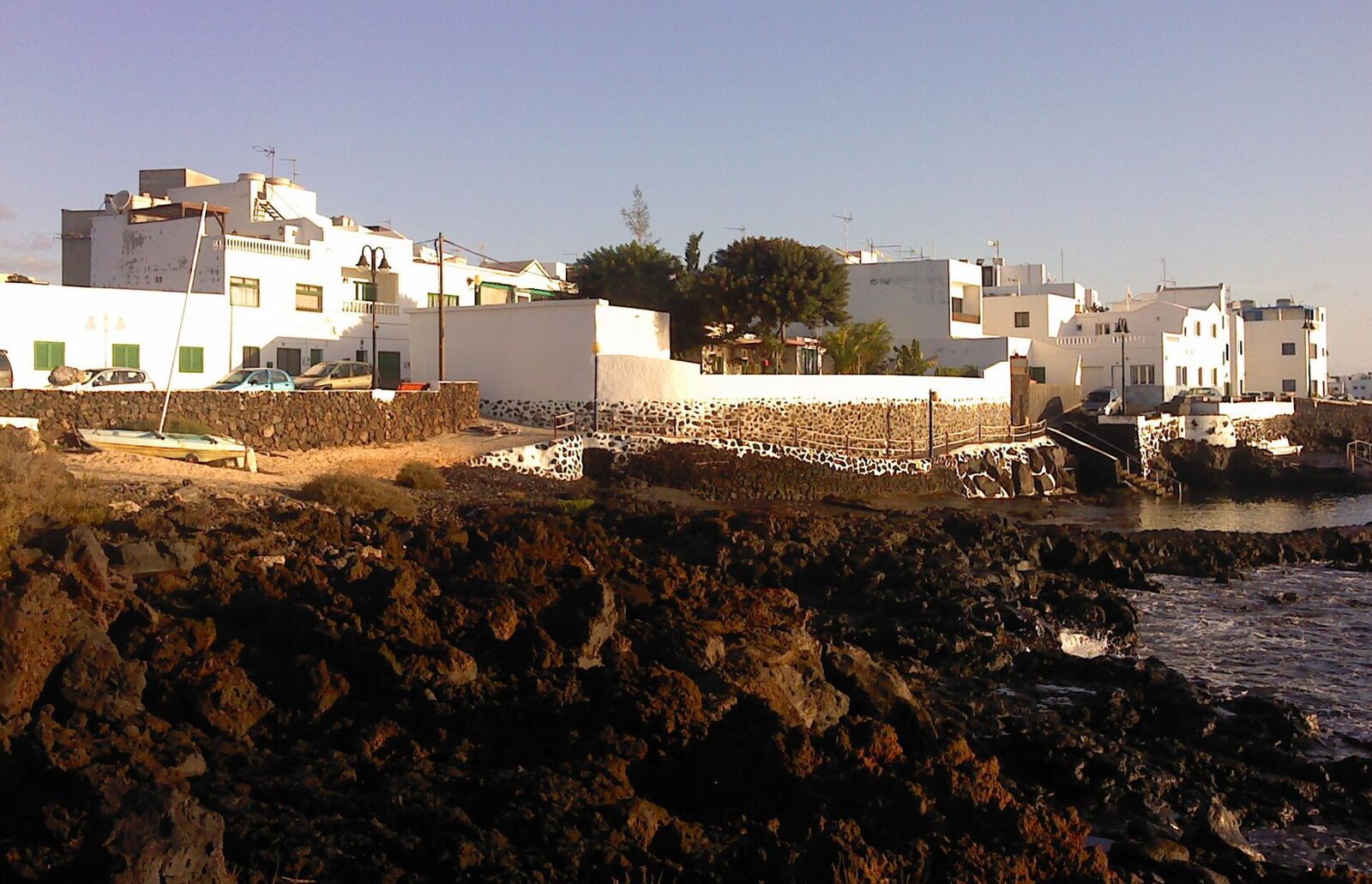 White houses and the lava shore at Punta Mujeres, Lanzarote